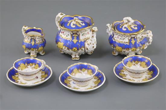 A Rockingham porcelain miniature tea set, c.1830-42, teapot 9.5cm across, damage to teapot